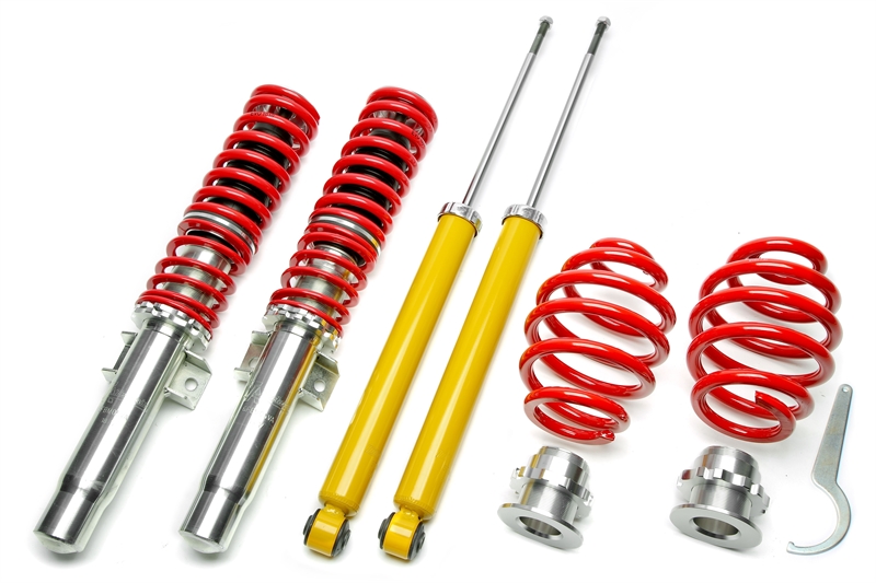Coilover kit with red springs, dampers and adjustable spring seats