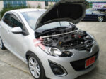 Ultra Racing front upper strut brace for Mazda 2 II (DE)